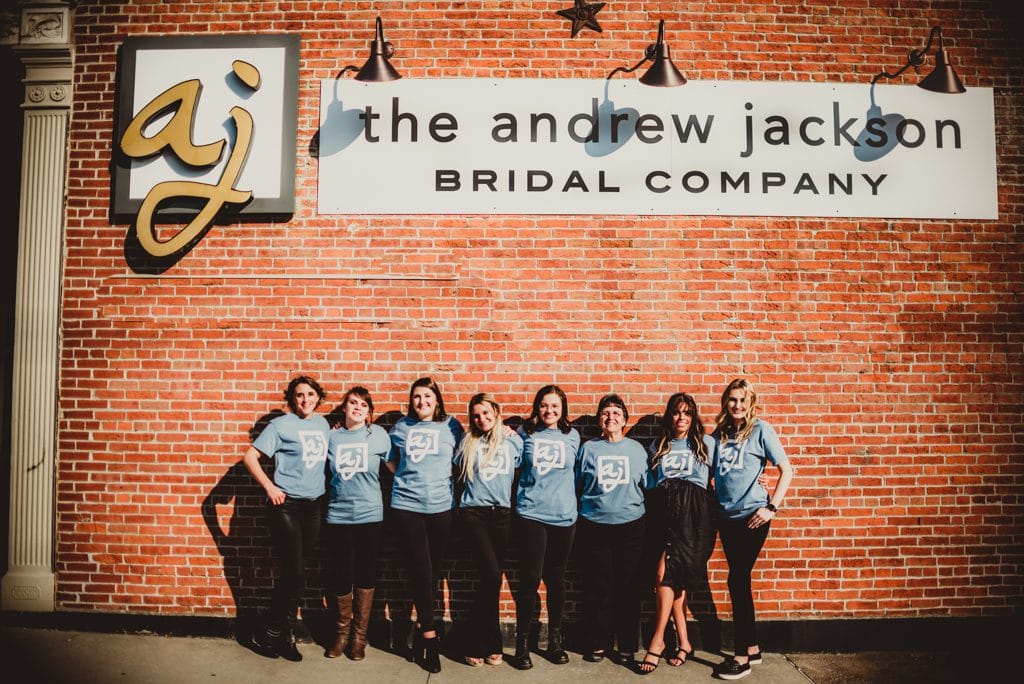 Staff standing outside The Andrew Jackson bridal company in Cape Girardeau