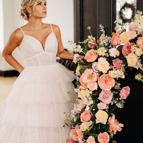 bride wearing a tulle ball gown wedding dress