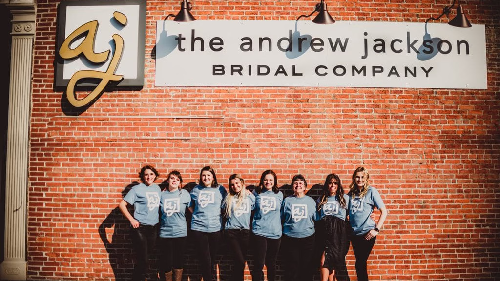 Staff standing outside The Andrew Jackson bridal company in Cape Girardeau